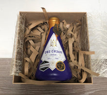 Load image into Gallery viewer, Open brown Gift box with 1 bottle of ube cream liqueur inside
